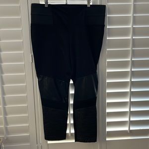 Black leggings with faux leather details from Eloquii